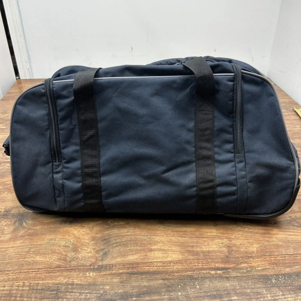 Eddie Bauer Rolling Duffel Navy Pocket Pull‎ Handle Travel Gym Bag New w/ Tags